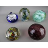 Five good sized vintage paperweights with bubble and swirl inclusion