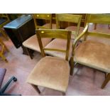 Polished wood drop leaf dining table and a set of six (five plus one) dining chairs