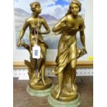 Pair of gilt painted spelter figurines on circular onyx bases after the originals by C H Perron