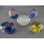 Five vintage glass paperweights having fish, butterfly and anemone decoration