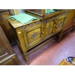 Carved two door hall sideboard