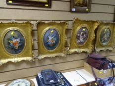Set of four gilt framed hand painted ovals - still life studies of flowers