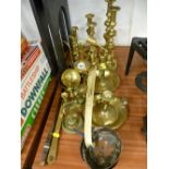 Collection of vintage brass candlesticks, chambersticks and other metalware