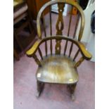 Small dark wood spindleback rocking chair