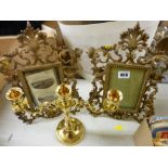 Pair of vintage cast metal portrait frames and a modern brass candelabra