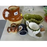 Two stoneware jugs, a Sylvac pottery planter etc