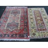 Two vintage style tassel ended carpets