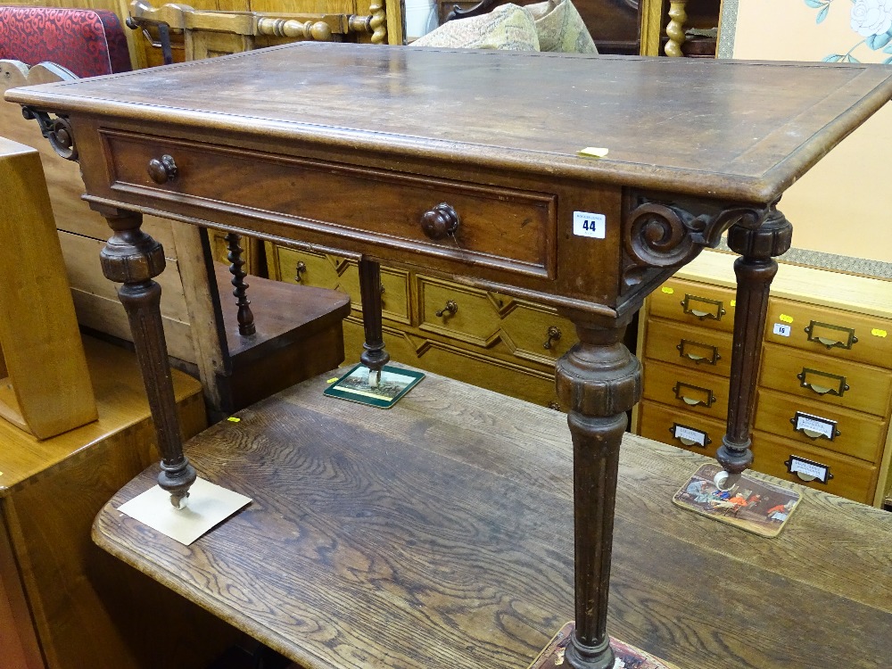 Victorian mahogany single drawer writing table on turned and reeded supports