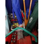 Plastic crate of various tennis balls, golf balls etc and wooden oars, folding camping chairs in