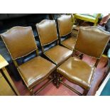 Well presented set of four oak and brass button edged upholstery dining chairs