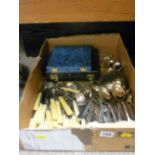 Parcel of mainly unboxed cutlery and two boxes of cutlery, knives and spoons