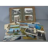 Vintage postcard album containing approximately one hundred cards