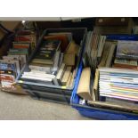 Two plastic crates and a box of vintage and other books