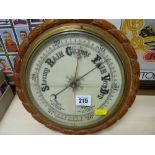 Oak framed aneroid barometer (glass cracked)