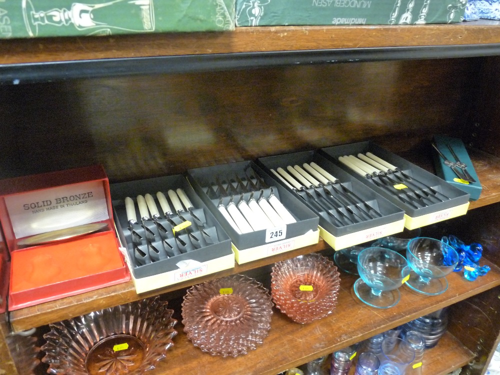 Parcel of boxed bone handled cutlery (top shelf)