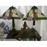 Composition model of an Art Deco lady figurine and a pair of antique style table lamps with