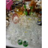 Pair of decorative green glass jugs, selection of drinks ware, bobble pattern globular vase etc
