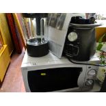 Small white compact microwave oven and a Cuisinart soup maker E/T