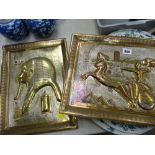 Two Egyptian decorated brass trays/plaques