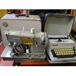 Cased Singer sewing machine and a cased typewriter