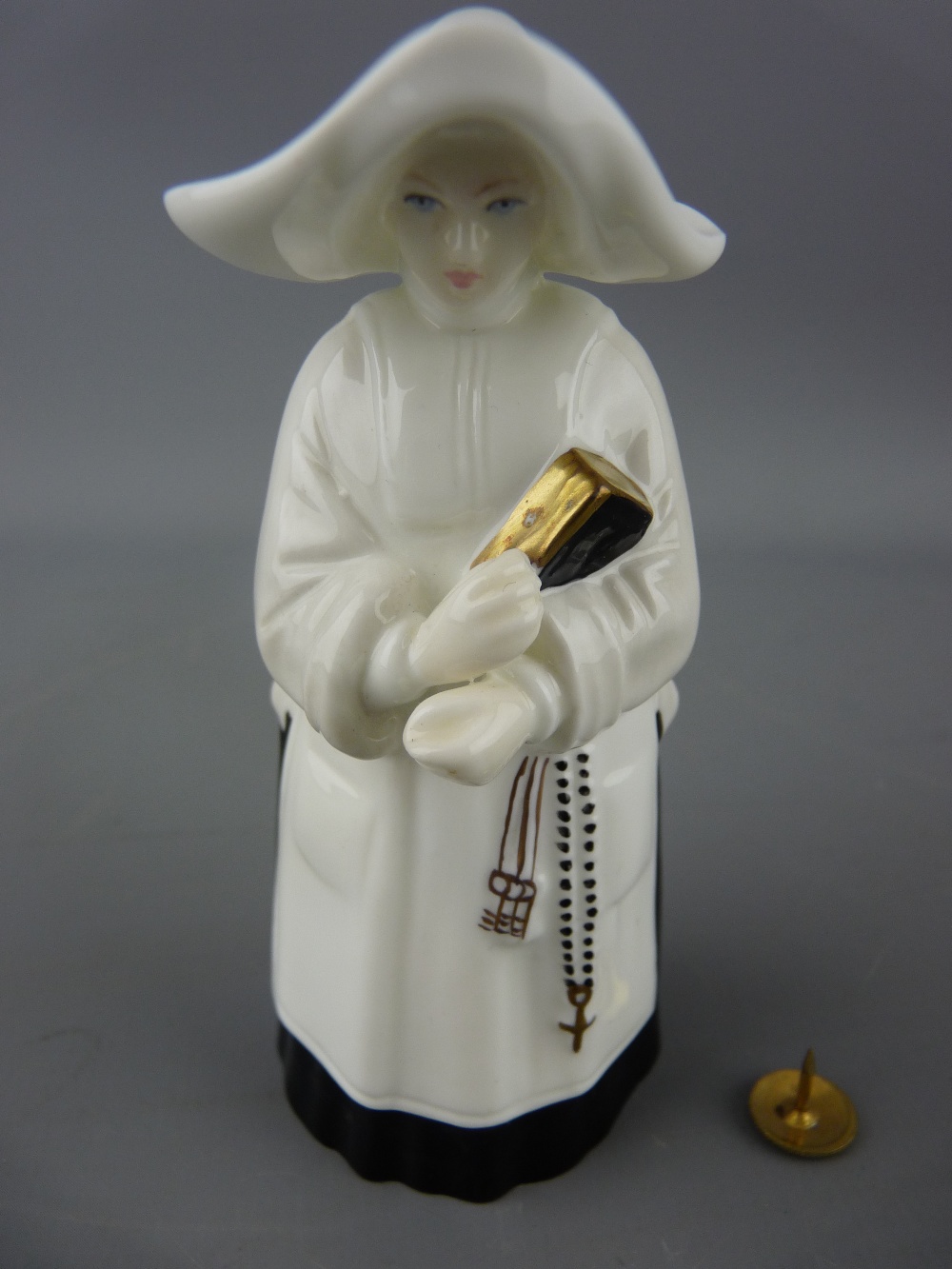Royal Worcester porcelain candle snuffer in the form of a nun