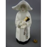 Royal Worcester porcelain candle snuffer in the form of a nun