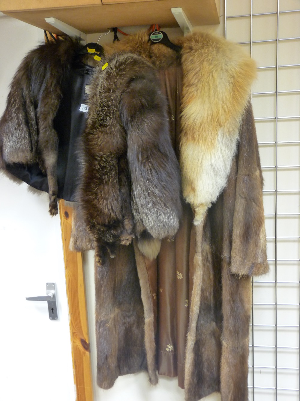 Lady's fur coat, fur jacket and stole and another stole