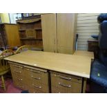 Excellent light wood suite of office furniture to include desk, four sets of drawers and two door