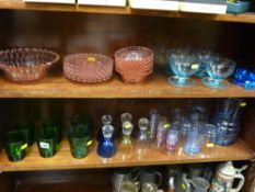 Two shelves of mixed glassware