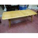 Ercol light wood coffee table with under tier spindle rack