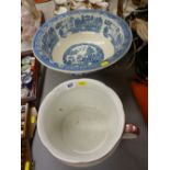 Willow pattern pottery washbowl and a lustre decorated chamber pot