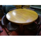 G-Plan crossbanded teak circular extending dining table and four matching dining chairs