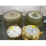 Three various brass cased clocks and a barometer
