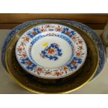 Black and gilt Willow pattern dish, a blue and white platter and a Newstone china flow blue bowl