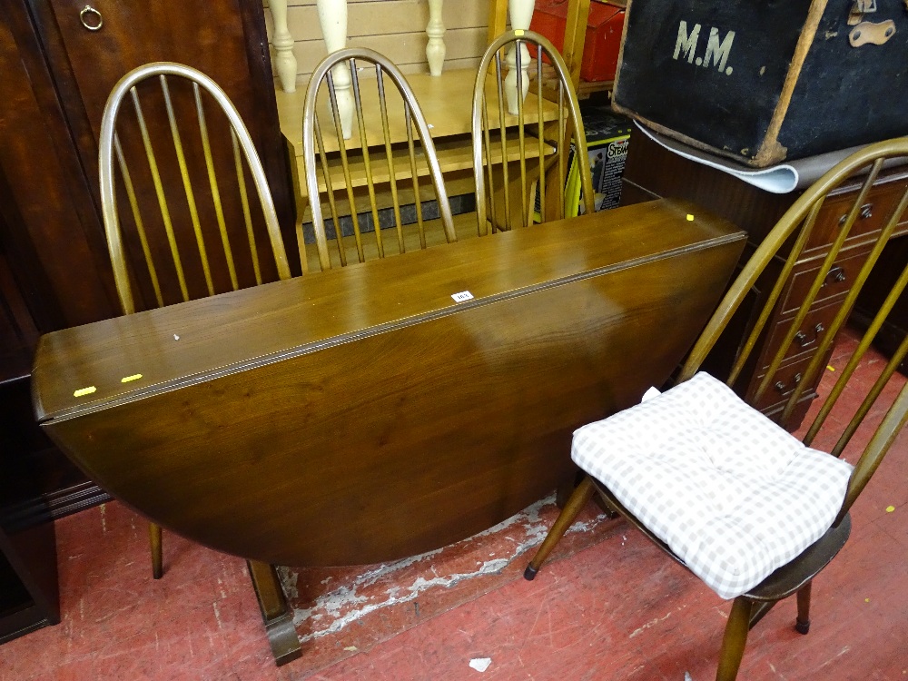 Slim Ercol drop leaf dining table and four stick back dining chairs