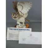 1988 Franklin Mint model of a great horned owl on a circular wooden base