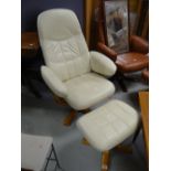 A modern swivel leather armchair & foot-stool Condition reports are provided on request by email