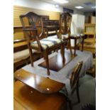 A good reproduction mahogany twin-pedestal dining table & six chairs including two carvers Condition