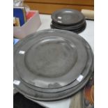A collection of antique pewter plates Condition reports are provided on request by email only for