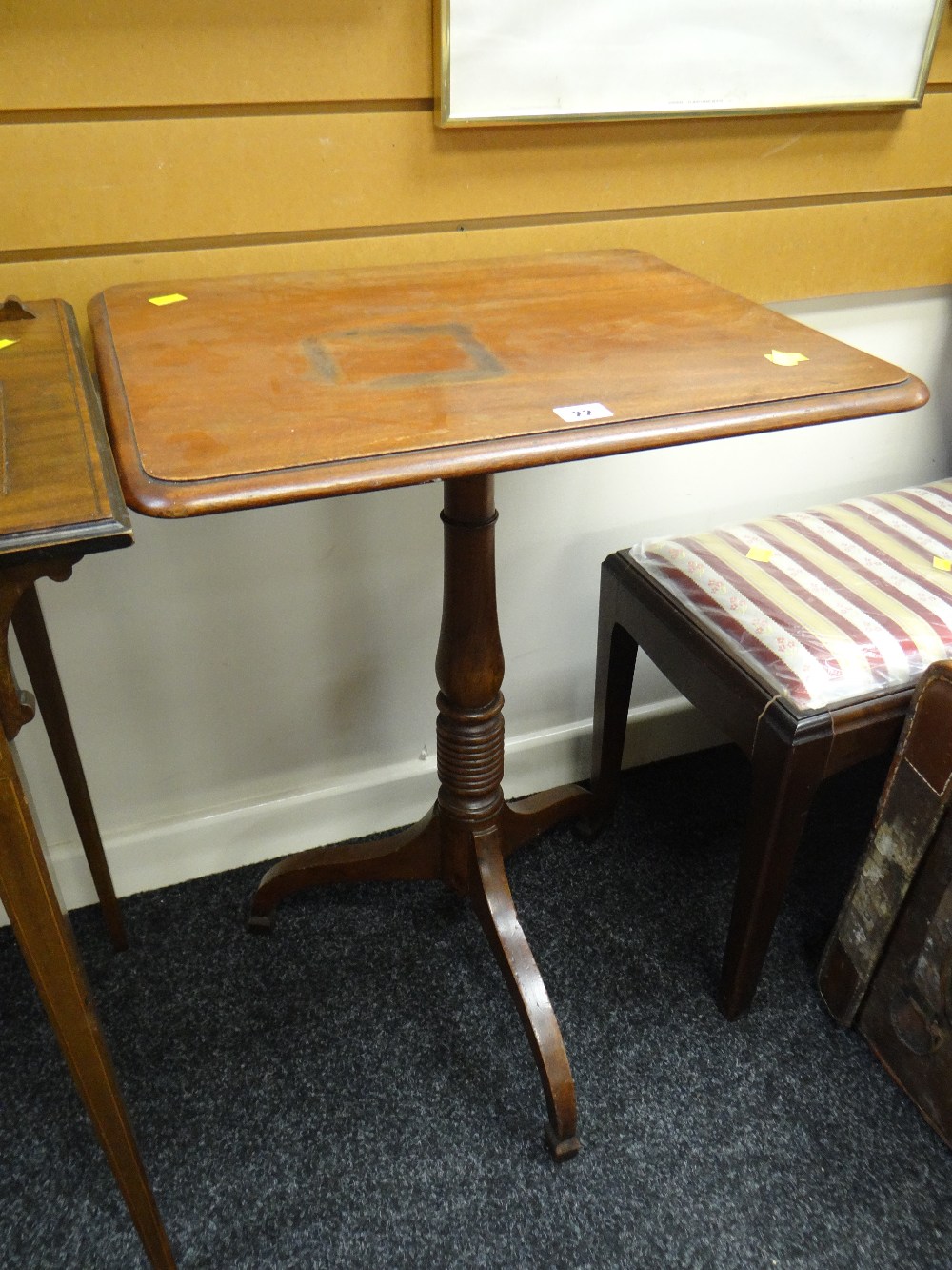 An antique mahogany tripod table Condition reports are provided on request by email only for this