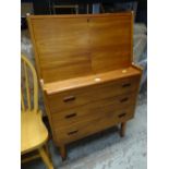 A mid-century teak bureau with three drawers & four front Condition reports are provided on