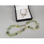 A seed pearl droplet necklace and a possibly green-jade and silver bead necklet
