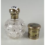 A silver topped scent bottle with screw top & hobnail cut bulbous body together with an Eastern