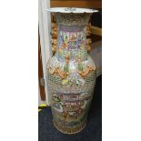 A floor standing Famille Rose vase with applied dragons & foo dog handle Condition reports are