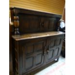 A good panelled Jacobean-style court cupboard Condition reports are provided on request by email