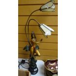 A reproduction figural table lamp Condition reports are provided on request by email only for this