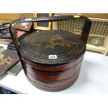 An Oriental lacquered food container Condition reports are provided on