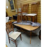 A modern extending dining table & four chairs Condition reports are provided on request by email