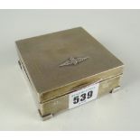 A square engine-turned silver RAF crest mounted cigarette box, Birmingham 1939 Condition reports are