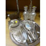 A three-bottle EPNS decanter caddy with bottles, quantity of loose cutlery, EPNS tray ETC